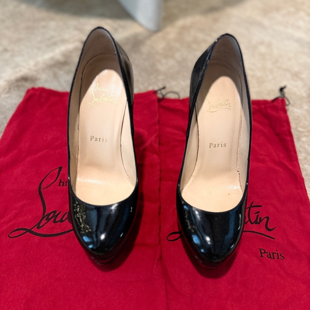 Christian Louboutin “Bianca” black patent leather pumps